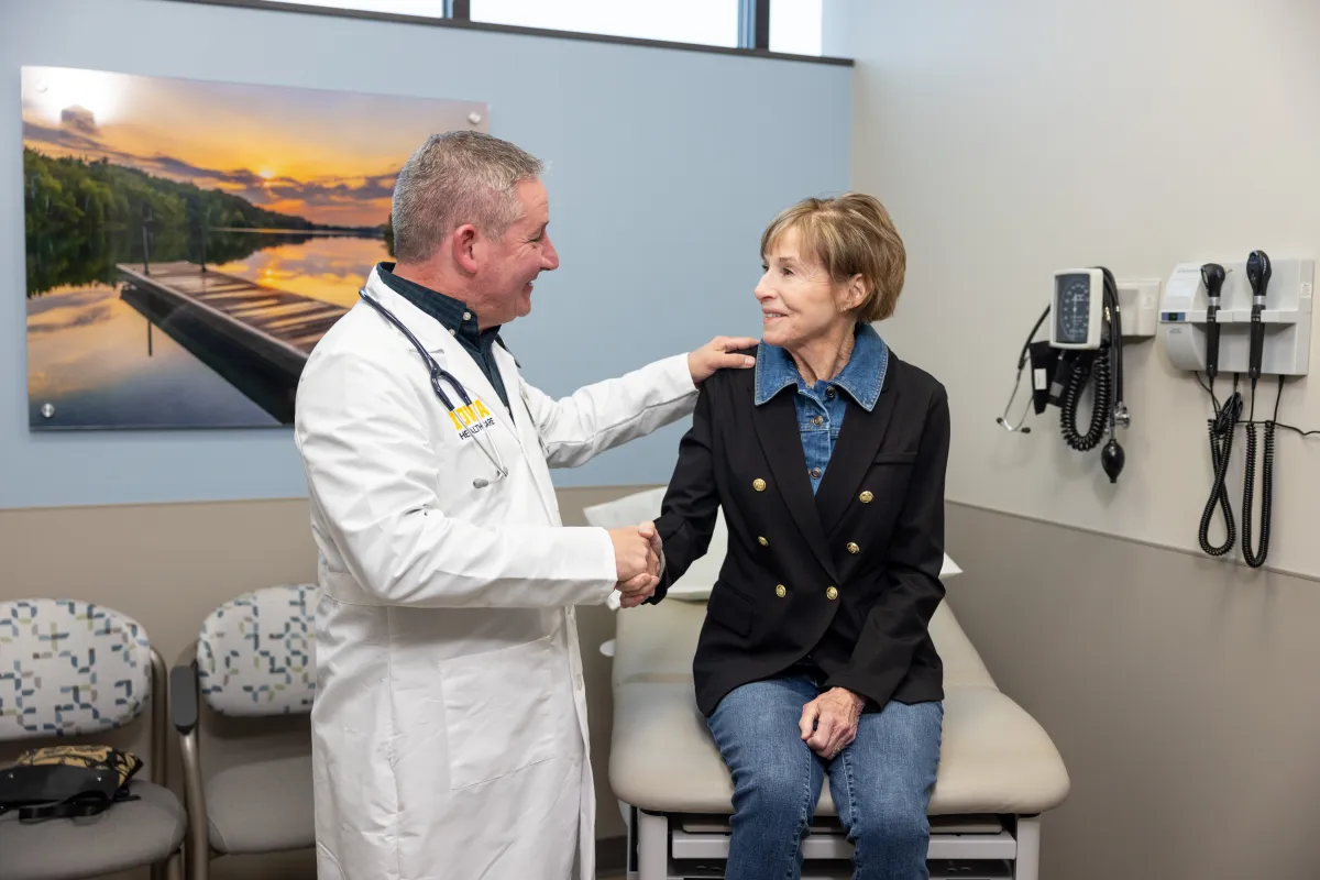 Doctor shakes hand with patient